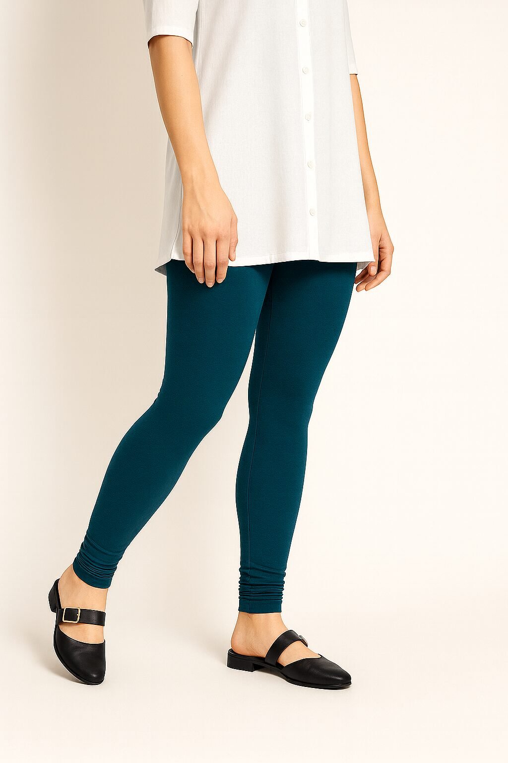 Teal blue ankle length leggings for women made from soft stretchable cotton fabric for comfortable daily wear